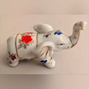 Vintage Hand Painted Porcelain Elephant Figurine With Gold Trim. 4.75"x2"x3"